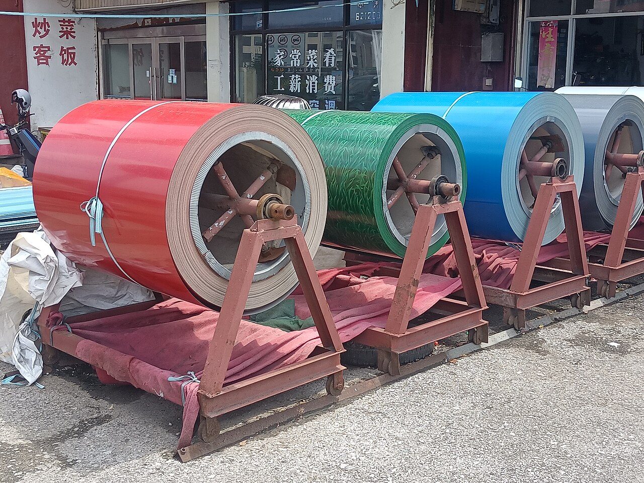 Coils of flat-rolled steel in a warehouse